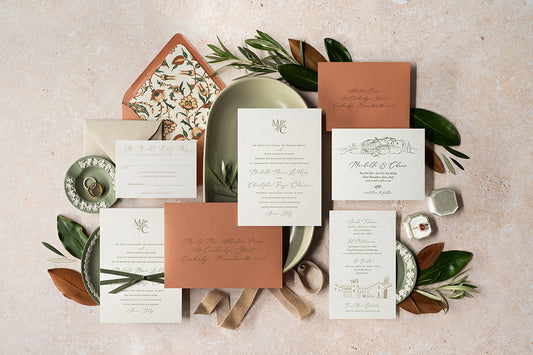 Custom wedding letterpress invitation suite with custom envelope liner, monogram and venue illustrations
